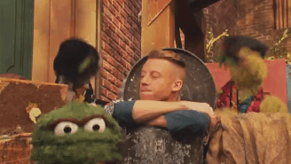 Macklemore Teams Up With Oscar The Grouch For A ‘Sesame Street’ Performance Of ‘Thrift Shop’
