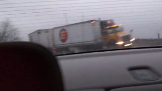 A Guy Filmed Himself Almost Getting Crushed By An Out-Of-Control 18 Wheeler On An Icy Highway