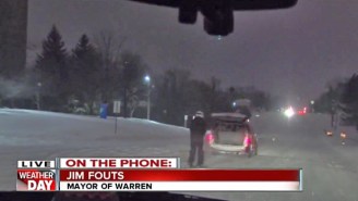 Watch This Car Pulling A Skier In Snowy Detroit Hilariously Get Pulled Over By Cops