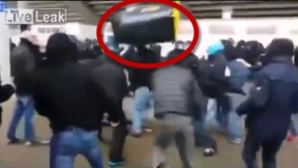 Worst Friend Ever Drills His Buddy With A Flying Garbage Can During This German Soccer Fight