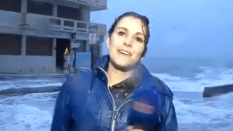 Watch This Reporter Get Wiped Out By A Large Wave During A Live Report