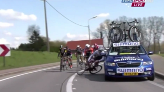 Watch This Service Car Take Out A Bicyclist During A Race