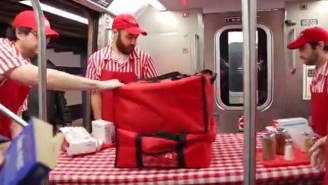 Improv Everywhere Gave Out Free Pizza To People Not ‘Manspreading’ On The Subway