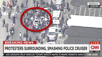 Watch A Mob Of People Annihilate This Baltimore Police Cruiser During Protests