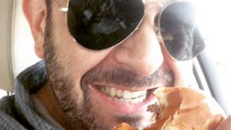 Adam Richman Posed With In-N-Out Burgers To Prove He’s Not A Vegan Anymore