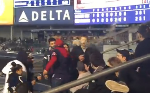 A's fan soaked in beer partied with Yankees fan who threw it