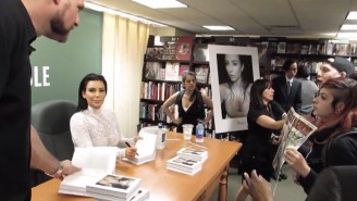 Kim Kardashian Kept Smiling While Animal Activists Protested Her Selfie Book Signing