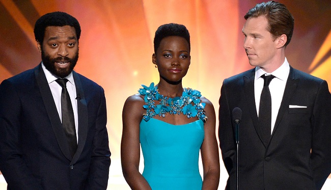 chiwetel-ejiofor-lupito-nyongo-nyong-o-benedict-cumberbatch_Getty-cropped.jpg LOS ANGELES, CA - JANUARY 18: (L-R) Actors Chiwetel Ejiofor, Lupita Nyong'o, Benedict Cumberbatch, and Sarah Paulson speak onstage during the 20th Annual Screen Actors Guild Awards at The Shrine Auditorium on January 18, 2014 in Los Angeles, California. (Photo by Kevork Djansezian/Getty Images) http://www.gettyimages.com/detail/news-photo/actors-chiwetel-ejiofor-lupita-nyongo-benedict-cumberbatch-news-photo/463578921