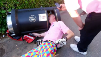 Watch This Dude Get His Head Stuck In A Trash Can After Golfing