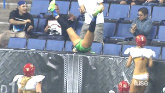Watch This Lingerie Football Player Go Flying Into The Crowd In Spectacular Fashion