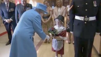 A British Guard Saluting The Queen Accidentally Decked A Little Girl In The Face
