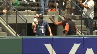 Watch This Father Of The Year Barehand A Home Run While Carrying Child