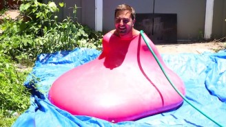 Here’s A Six-Foot Man Flopping About In A Giant Water Balloon Until It Explodes