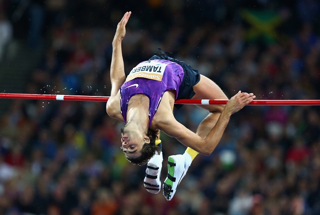 Gianmarco Tamberi half beard mid jump