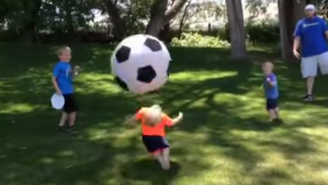 Watch This Guy Accidentally Nail A Kid In The Face With A Giant Soccer Ball