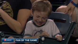 Watch This Young Baseball Fan Desperately Try (And Fail) To Crack Open A Pesky Peanut