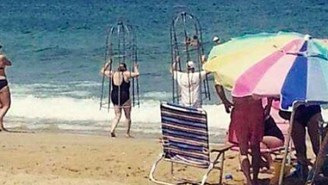 Are These Brilliant Beachgoers Really Using A Homemade Shark Cage?