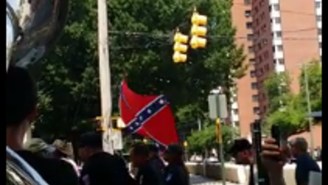 Watch As This Sousaphone Player Trolls A Group Of Confederate Flag Supporters On Their Way To A KKK Rally