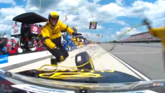 Watch Brad Keselowski Run Over Two Crew Members During A Pit Stop