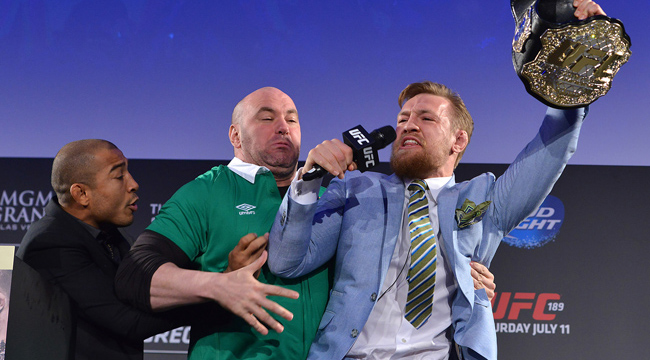 conor-mcgregor-jose-aldo-belt-snatch