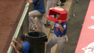 Watch As This Baseball Player Successfully Uses A Trash Can Lid As A Helmet