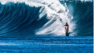 Watch This Guy Ride A Dirt Bike On A Wave Like He’s Surfing