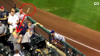 Watch This Poor Fan Take A Baseball Right Off His Bald Head