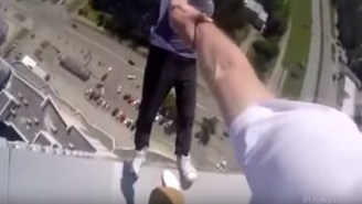 These Daredevils Performing Tricks Atop A 40-Story Building Will Give You A Panic Attack