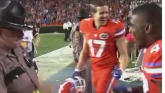 Watch This Police Officer Dance With A Florida Player After The Gators Big Win