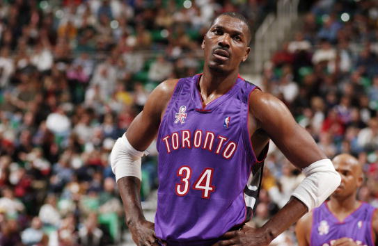 10 Nov 2001: Hakeem Olajuwon #34 of the Toronto Raptors looks on during their game against the Utah Jazz at Delta Center in Salt Lake City, UT. The Raptors won, 117-96. Mandatory Credit: Kent Horner/NBAE/Getty Images Digital Image NOTE TO USER: User expressly acknowledges and agrees that, by downloading and/or using this Photograph, User is consenting to the terms and conditions of the Getty Images License Agreement. Mandatory copyright notice: Copyright 2001 NBAE