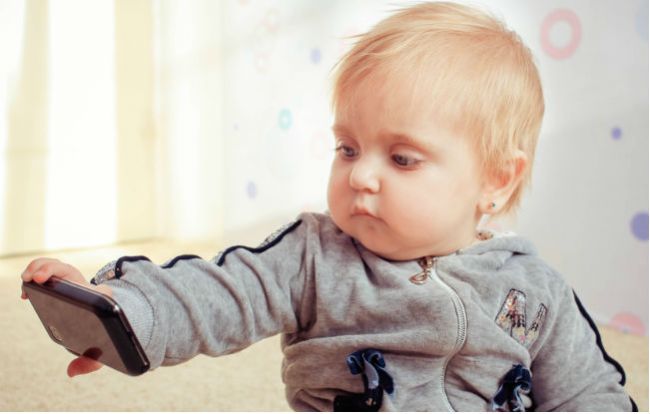 baby taking selfie