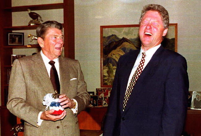 U. S. President-elect Bill Clinton (R) laughs as f