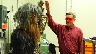 Watch A Curious Chewbacca Interview Real Scientists About Holograms, Lightsabers, And More