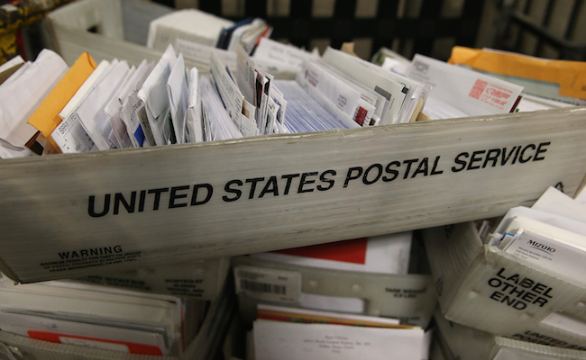 U.S. Post Service Handles Increased Delivery Load For Holiday Season