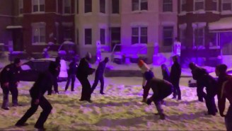 D.C. Cops Joined In On A Snow Football Game, And One Officer Delivered A Brutal Stiffarm 