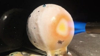 There’s Something Hypnotic About This Giant Jawbreaker Being Melted With A Blowtorch