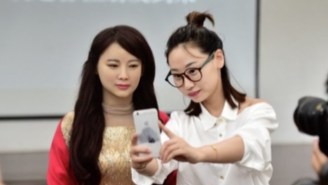 China’s Newest Robot Knows When You’re About To Take A Bad Photo Of Her