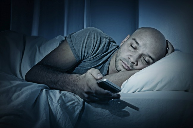 sleeping iphone man