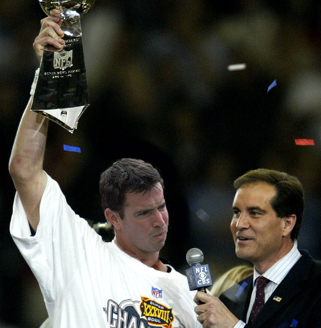 Todd Husak hoists his first of four Lombardi trophies with the Patriots.