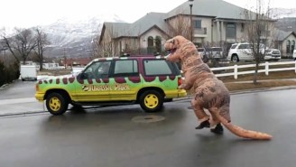 For Your Viewing Pleasure, Here Is A Person In A T-Rex Costume Chasing A ‘Jurassic Park’ Vehicle