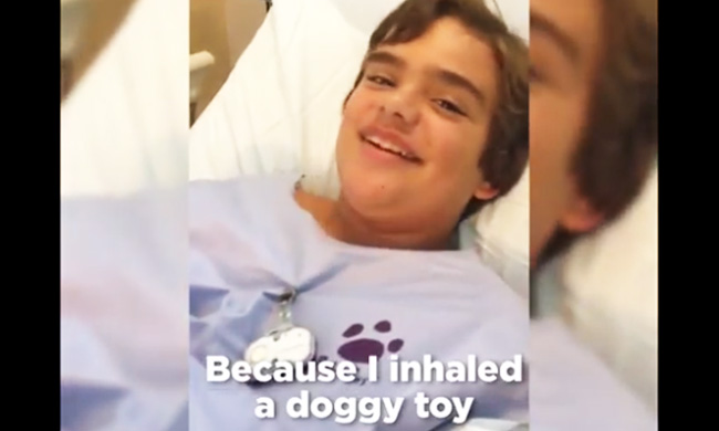 boy inhales dog toy