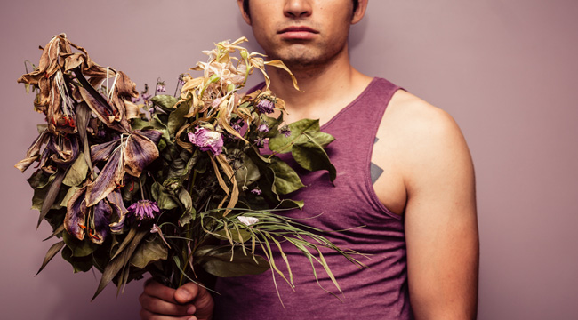 man-wilted-flowers