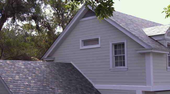 musk unveils solar roofs universal