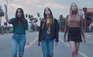Haim’s ‘Want You Back’ Video Is A Pop Nostalgia Funhouse, Complete With Wacky Dancing