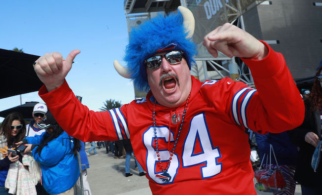 Bill Cowher joined the Bills Mafia by jumping through a table