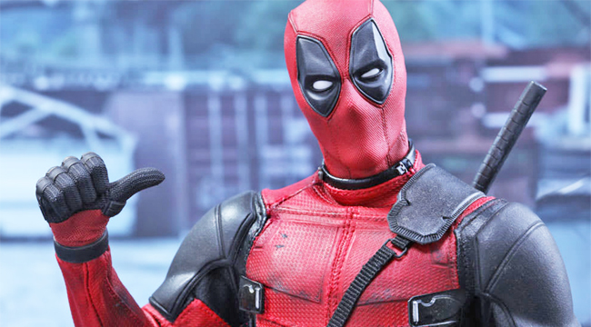 Ryan Reynolds shows off abs under 'Deadpool' suit 