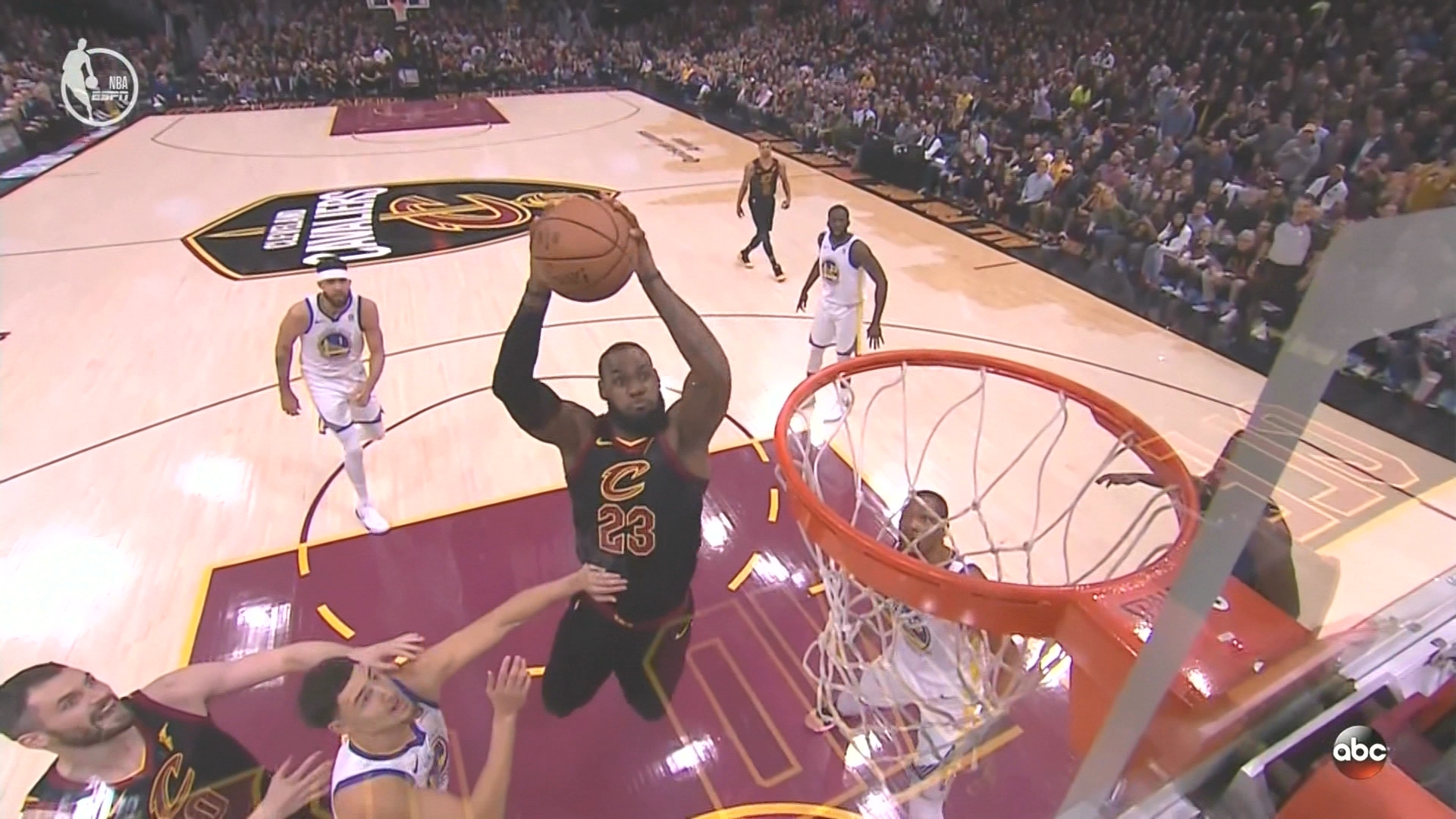 LeBron James soars for reverse alley-oop with head in the mesh