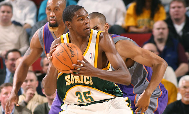 Kevin Durant takes the floor wearing Sonics jersey before preseason game in  Seattle