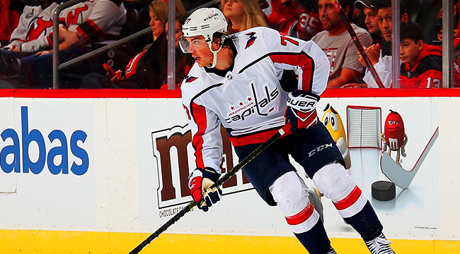 Washington Capitals' T.J. Oshie chugs a beer through his jersey at Stanley  Cup rally 