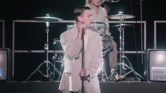 The 1975’s ‘It’s Not Living (If It’s Not With You)’ Video Is A Paranoid Talking Heads Tribute